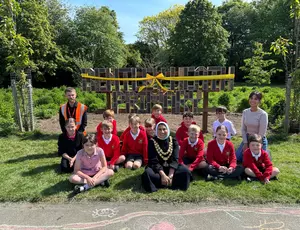 The Mayor of Solihull, Shameena Villars from the Love Solihull team, and Lewis Hayden, service delivery manager for Veolia just before cutting the ribbon on Bentley Heath bug hotel.