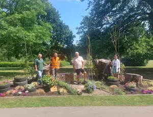 Cllr Hawkins and Representatives from Love Solihull, Veolia and Newlands Bishop Farm stand within the newly installed flower bed