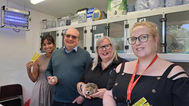 Representatives from Love Solihull, Cllr Mackiewicz, Solihogs and Veolia stood in front of hedgehog containers at Solihogs