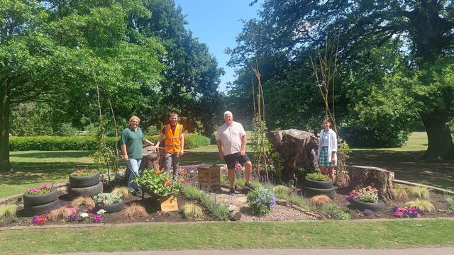 Cllr Hawkins and Representatives from Love Solihull, Veolia and Newlands Bishop Farm stand within the newly installed flower bed