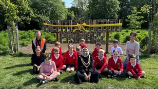 The Mayor of Solihull, Shameena Villars from the Love Solihull team, and Lewis Hayden, service delivery manager for Veolia just before cutting the ribbon on Bentley Heath bug hotel.